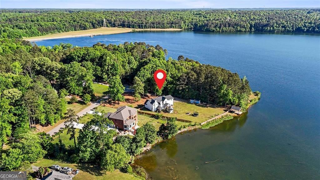 Welcome to 1229 Park Place Drive, a beautifully updated waterfront res – image 39