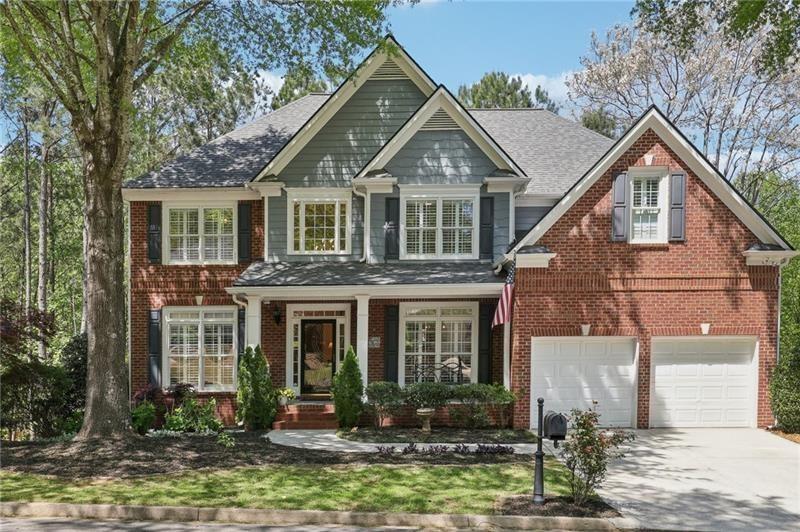 This beautiful home located on a cul-de-sac backs up to a private wood – image 1