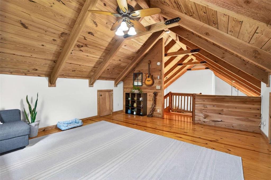 Fully furnished true log home on 5.78 private wooded acres in sought-a – image 11