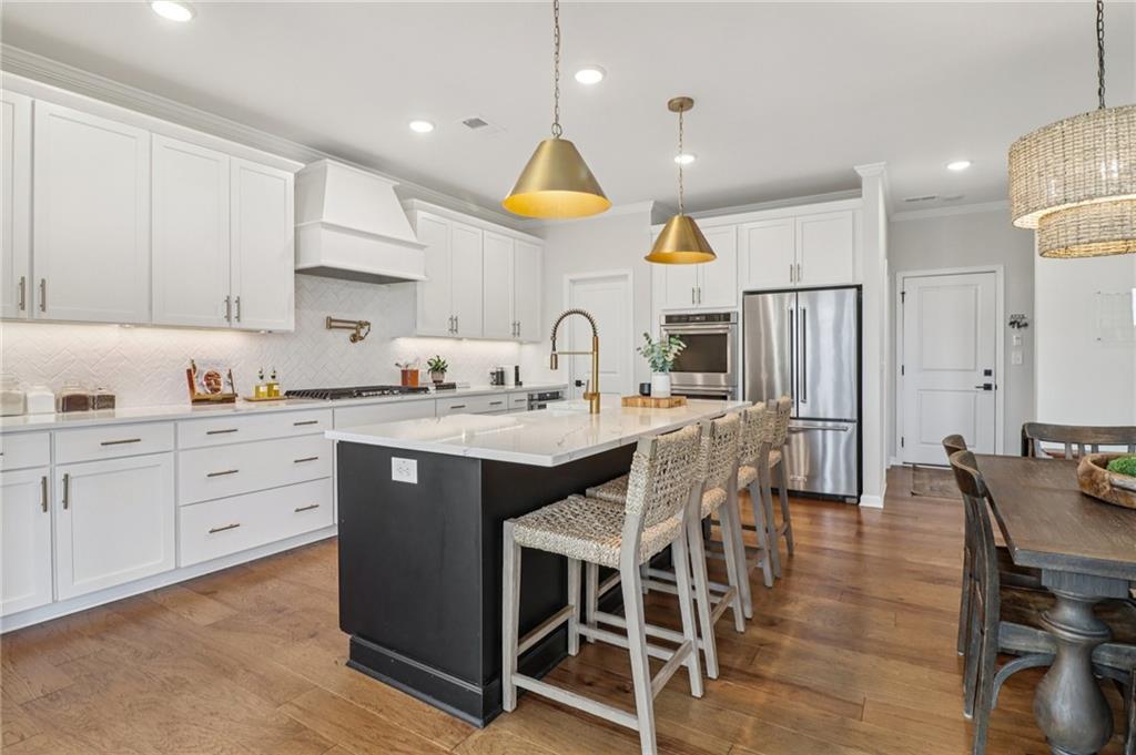Welcome to luxury living in the heart of West Forsyth, where designer – image 8