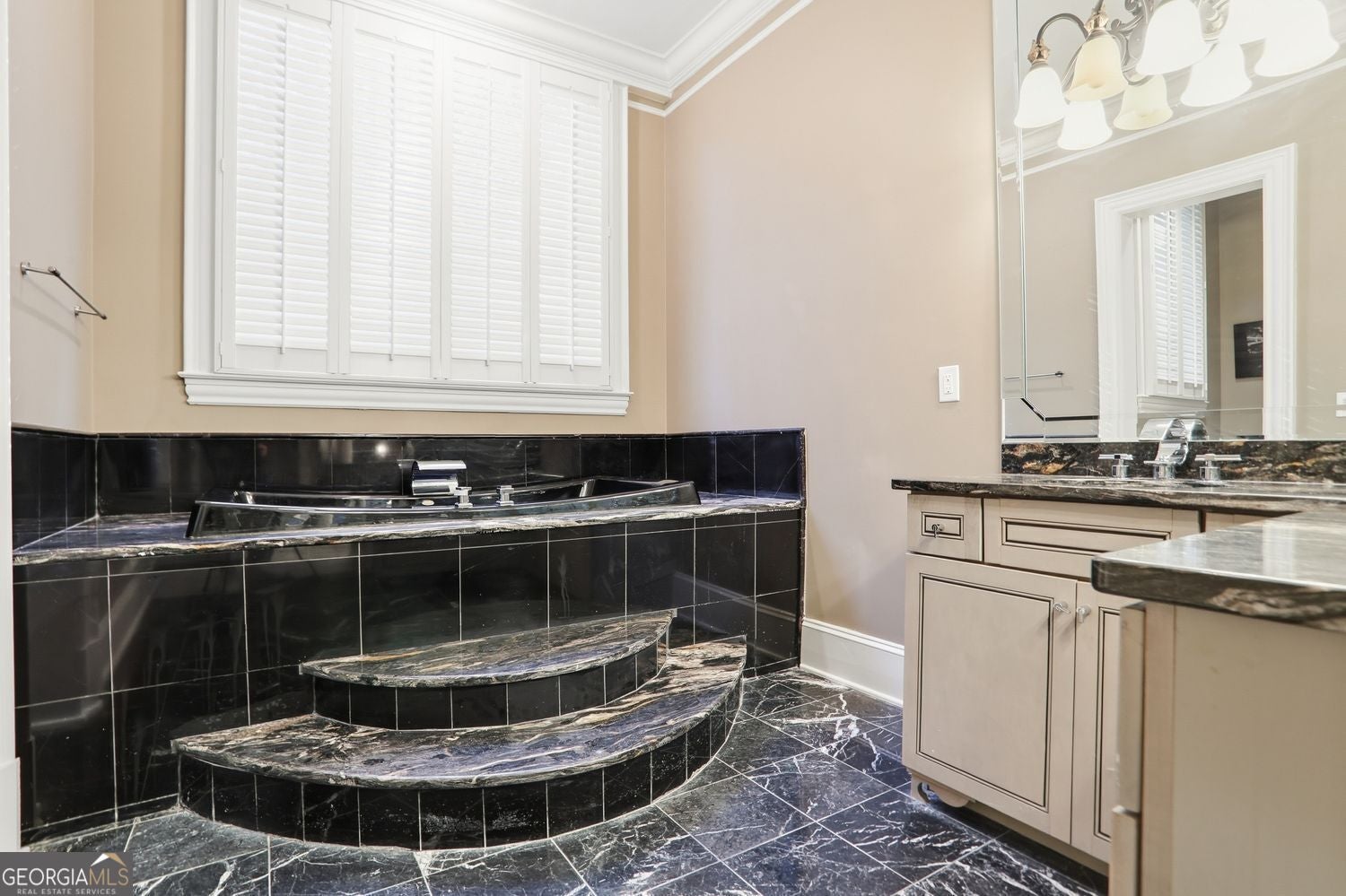 Set on 3.8 beautifully manicured acres, this elegant gated estate offe – image 123
