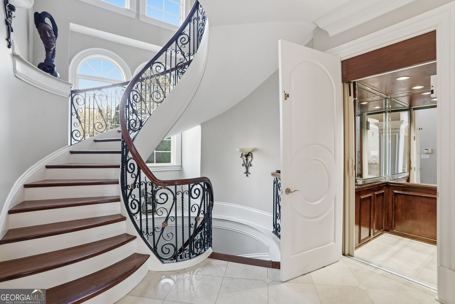 Set on 3.8 beautifully manicured acres, this elegant gated estate offe – image 83