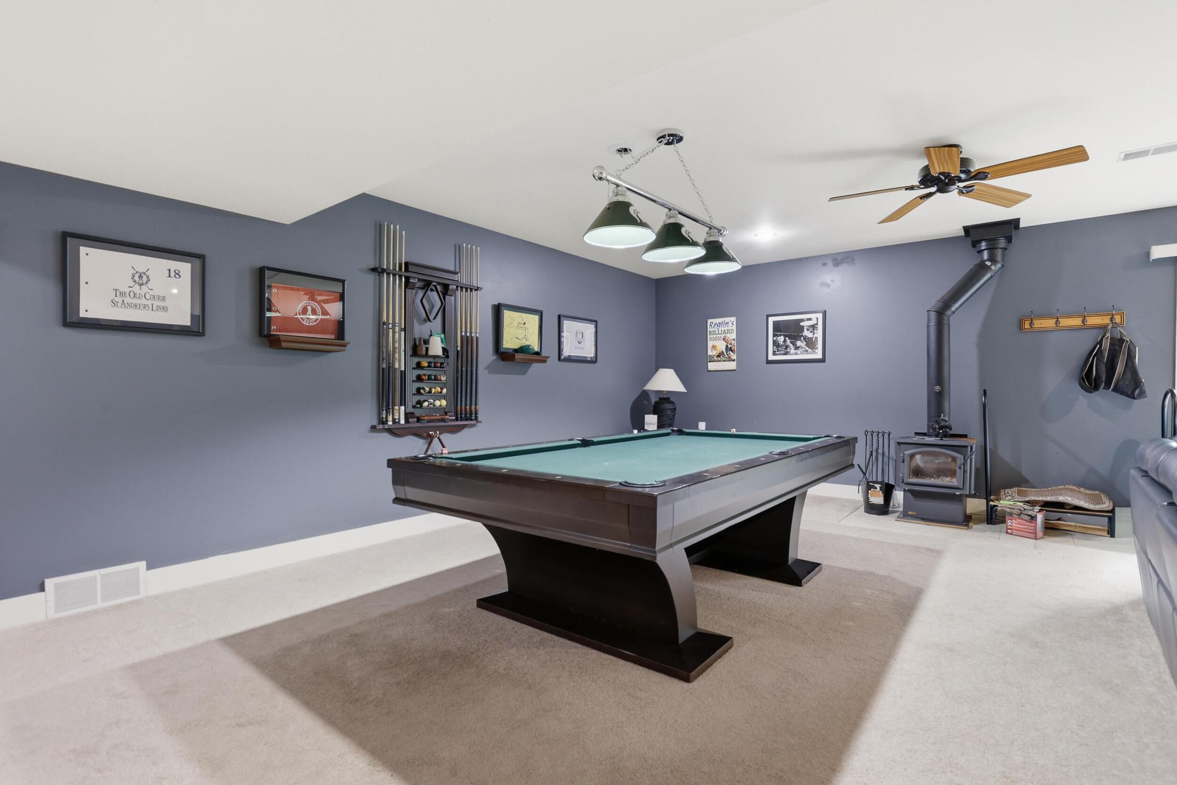Tucked away on over an acre along the Little Muskegon River in the hea – image 35