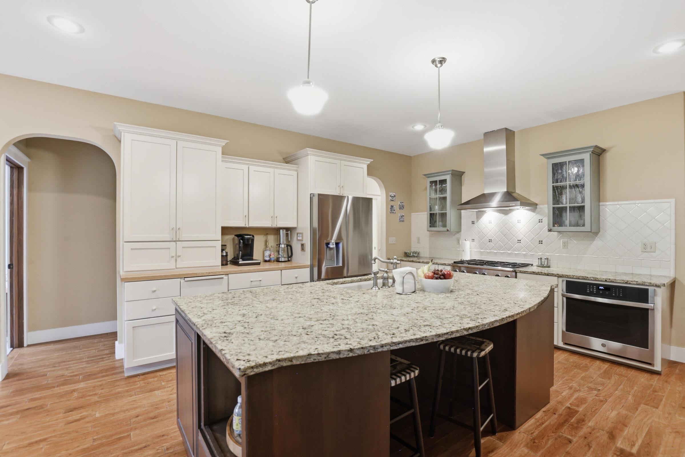 Tucked away on over an acre along the Little Muskegon River in the hea – image 18