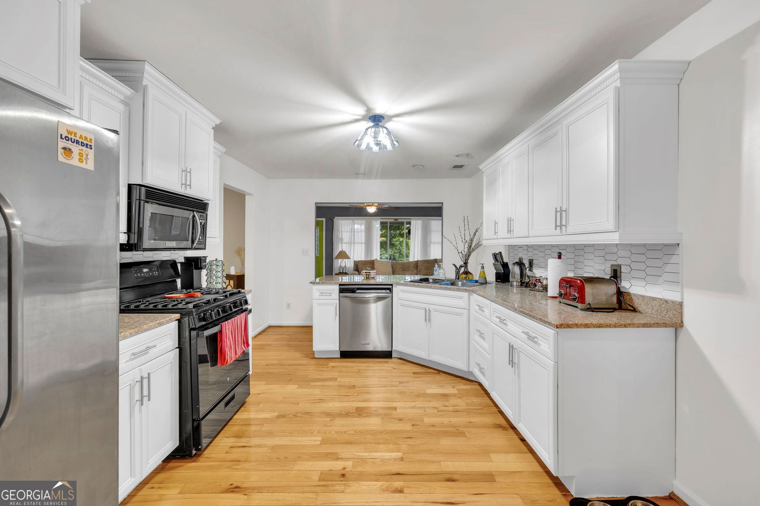 Come see this Grant Park Bungalow KITCHEN. LIVING ROOM AND BEDROOM/OFF – image 4