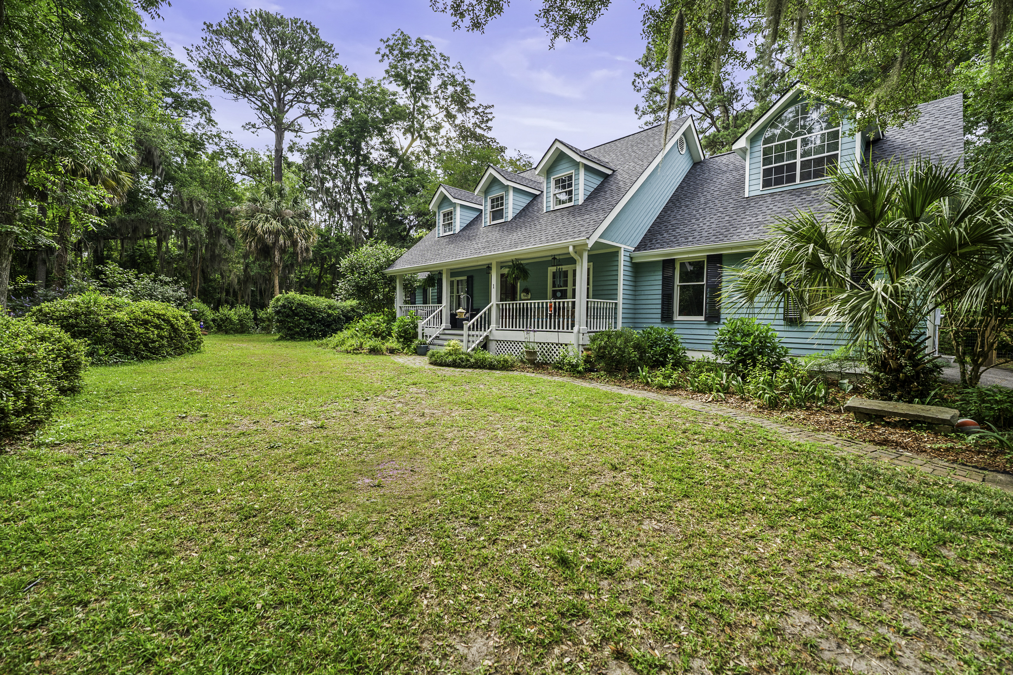 One of a kind, Lowcountry Living! This beautiful house sitting amongst – image 2