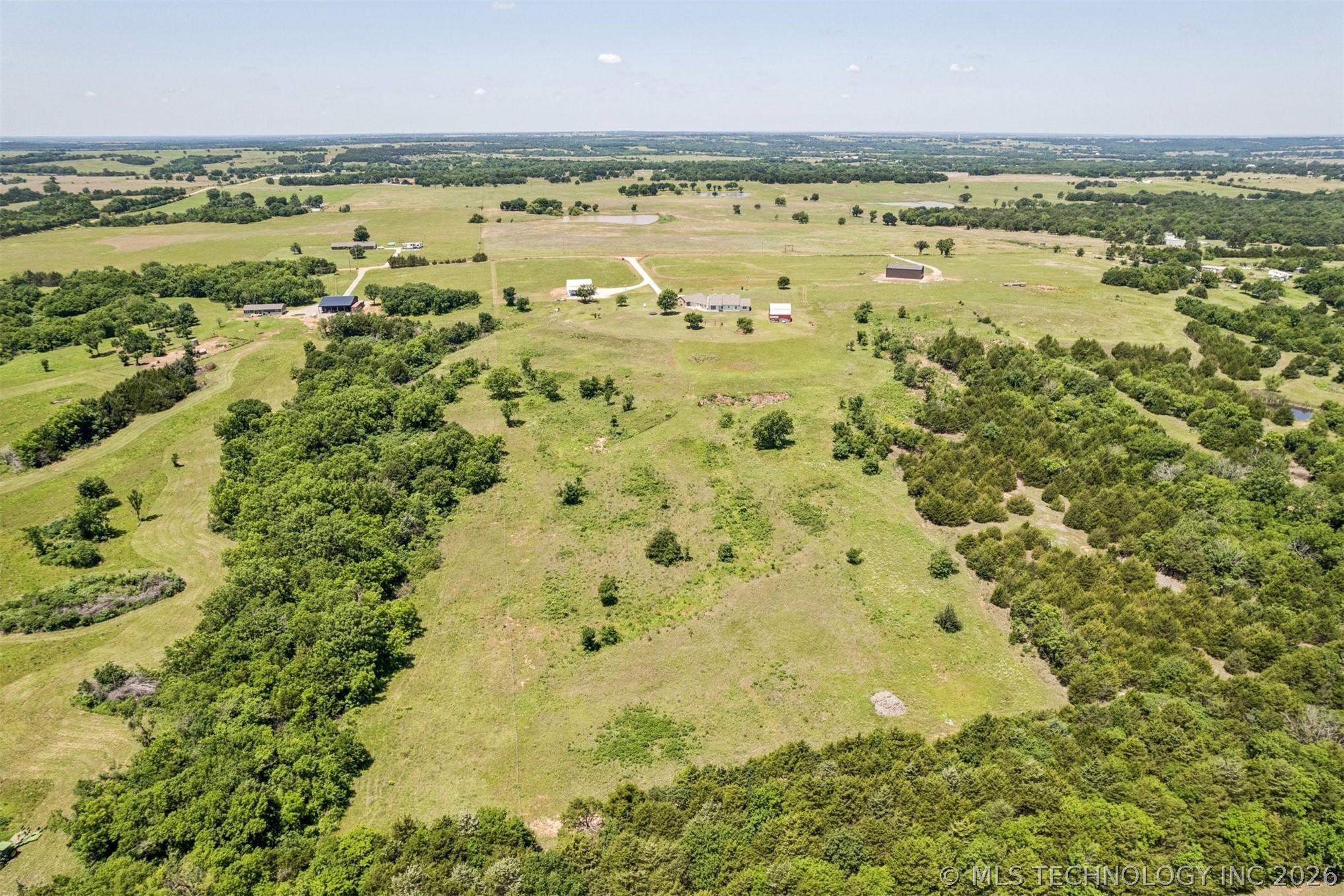 Country Luxury at Its Finest! Nestled on 18 breathtaking acres with pa – image 4