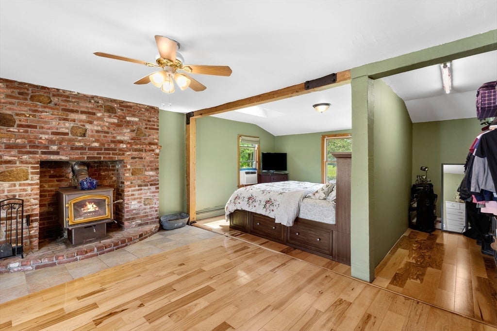 Nestled on over 2 acres, this Classic New England Cape offers the perf – image 19