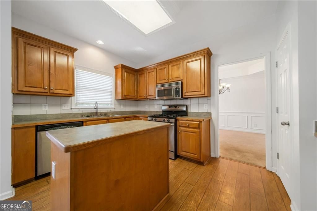 Just listed in the sought-after Arbors at Old Peachtree subdivision! T – image 14