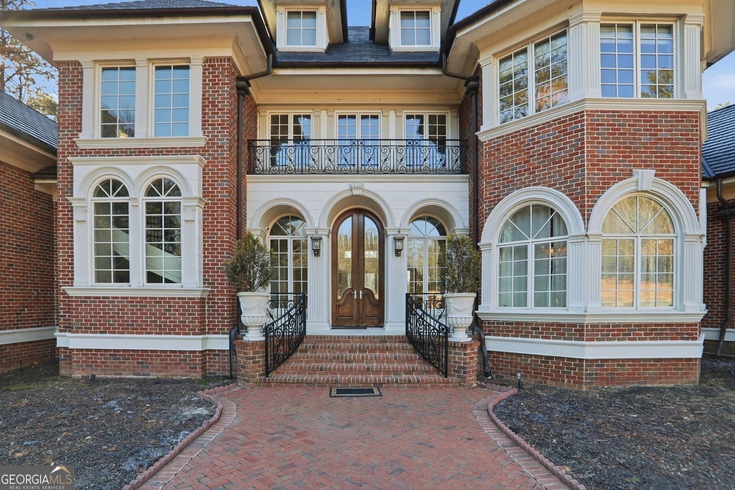 Set on 3.8 beautifully manicured acres, this elegant gated estate offe – image 78