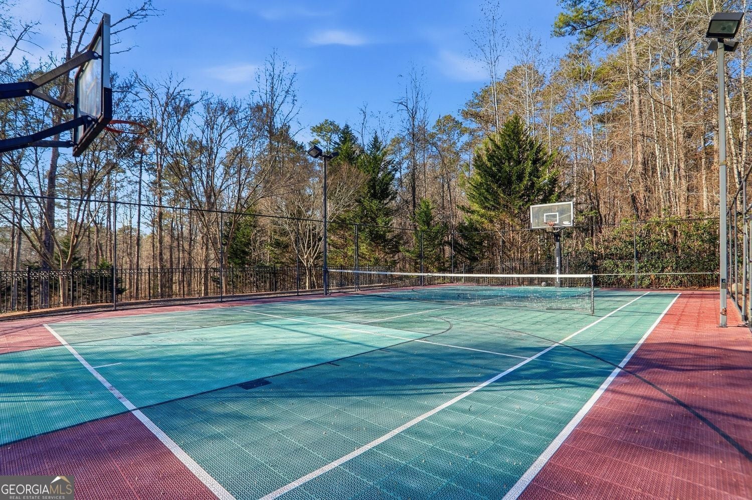 Set on 3.8 beautifully manicured acres, this elegant gated estate offe – image 144