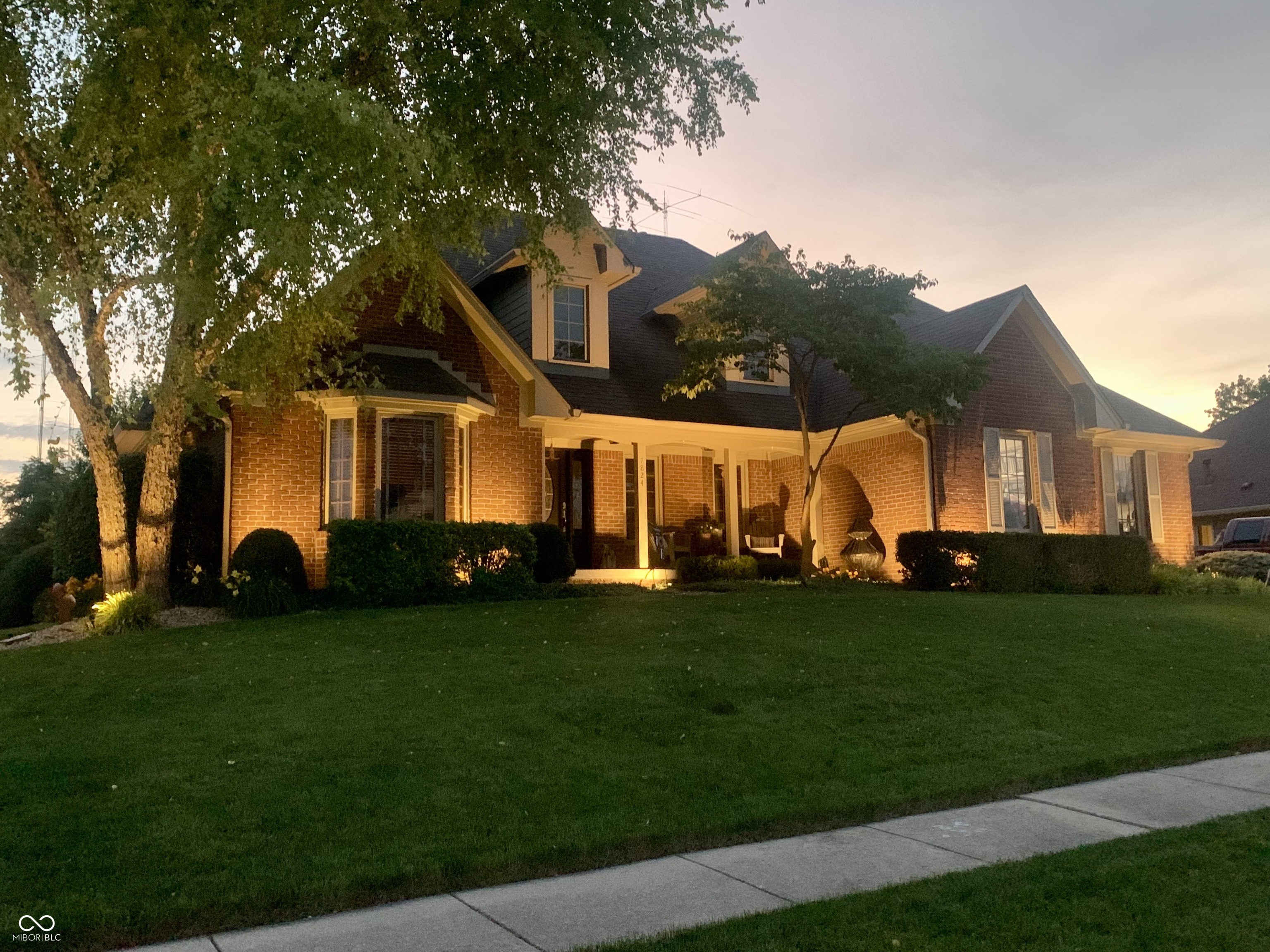 Step inside and instantly feel at home in this custom brick Cape Cod n – image 64