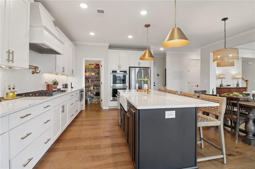Welcome to luxury living in the heart of West Forsyth, where designer – image 10