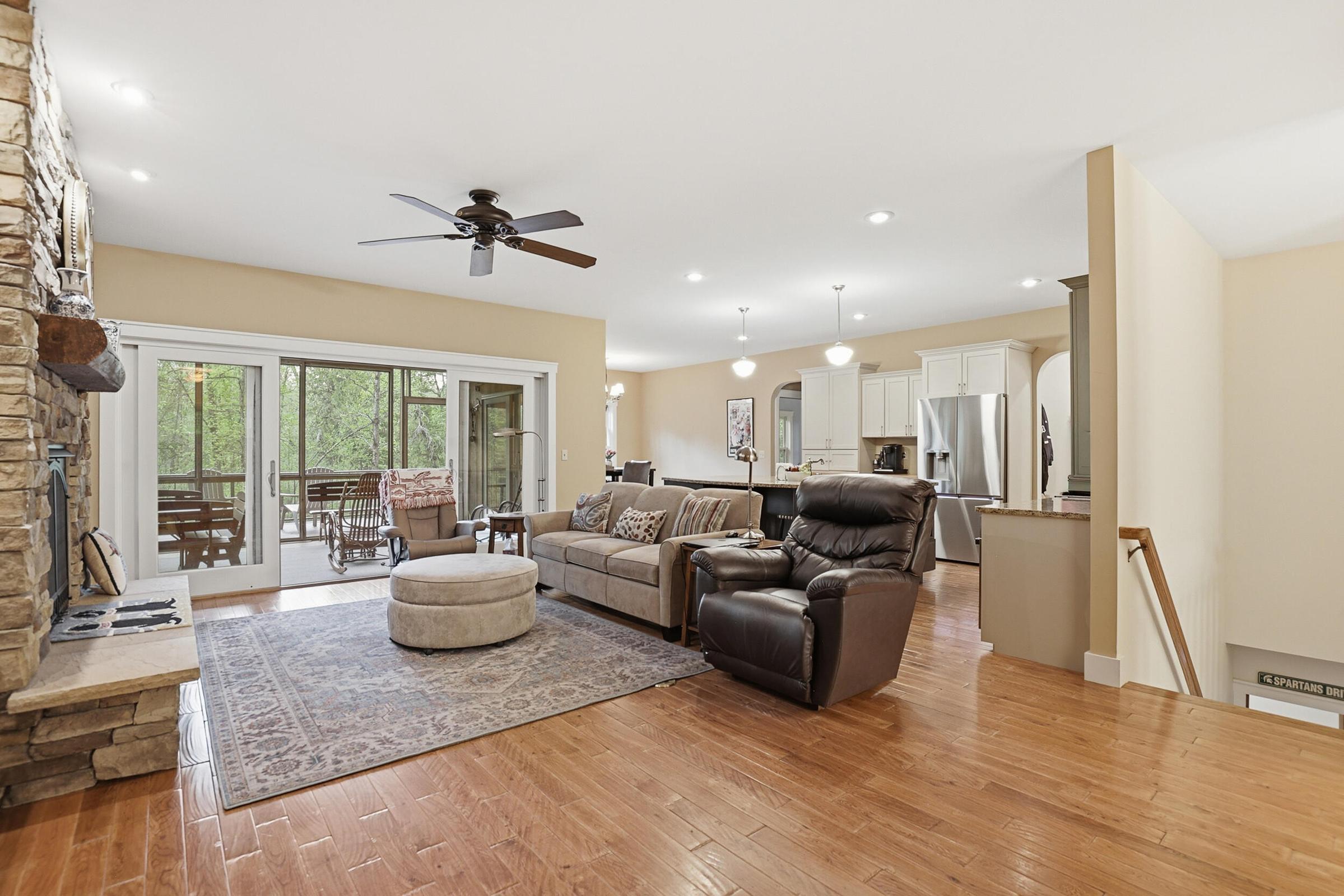 Tucked away on over an acre along the Little Muskegon River in the hea – image 12
