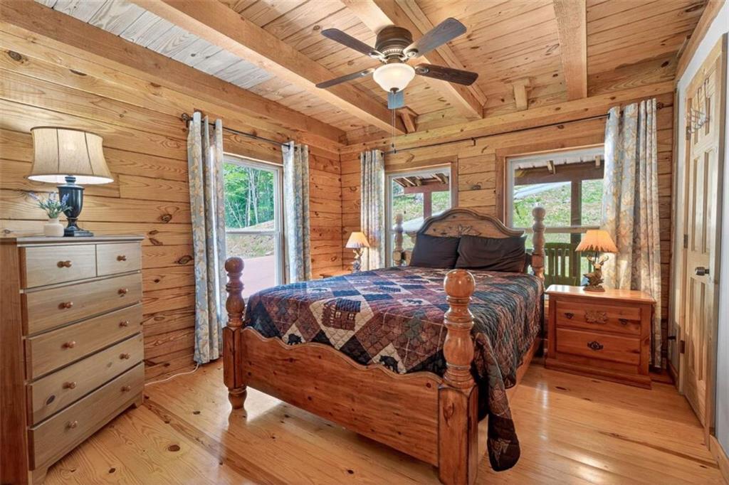 Fully furnished true log home on 5.78 private wooded acres in sought-a – image 24