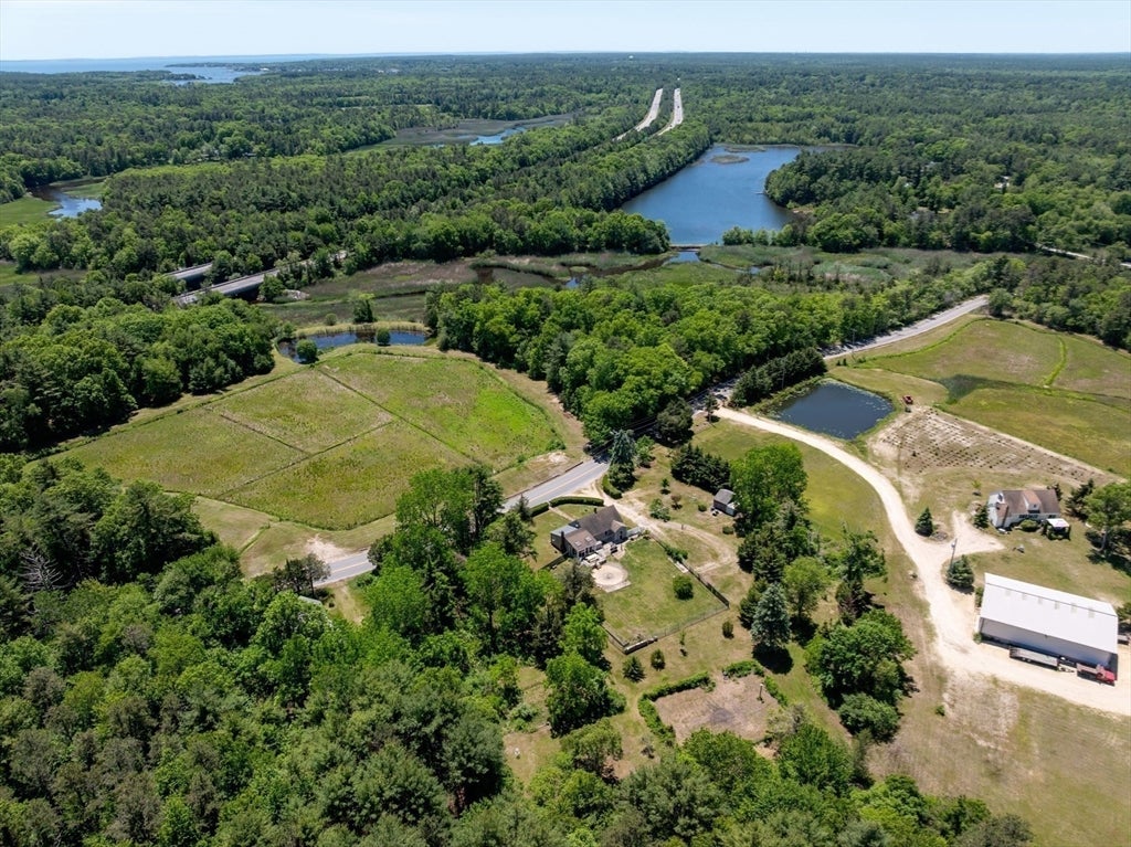 Nestled on over 2 acres, this Classic New England Cape offers the perf – image 37