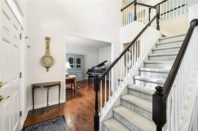 This beautiful home located on a cul-de-sac backs up to a private wood – image 5