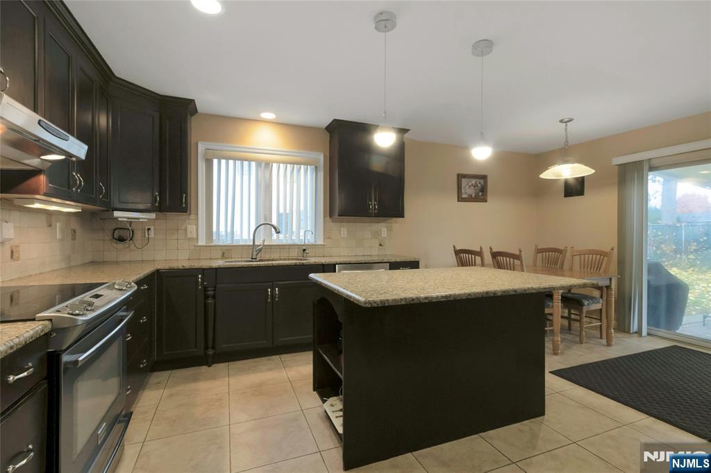 Emerson, New Jersey, 07630, United States, 4 Bedrooms Bedrooms, ,3 BathroomsBathrooms,Residential,For Sale,1991128