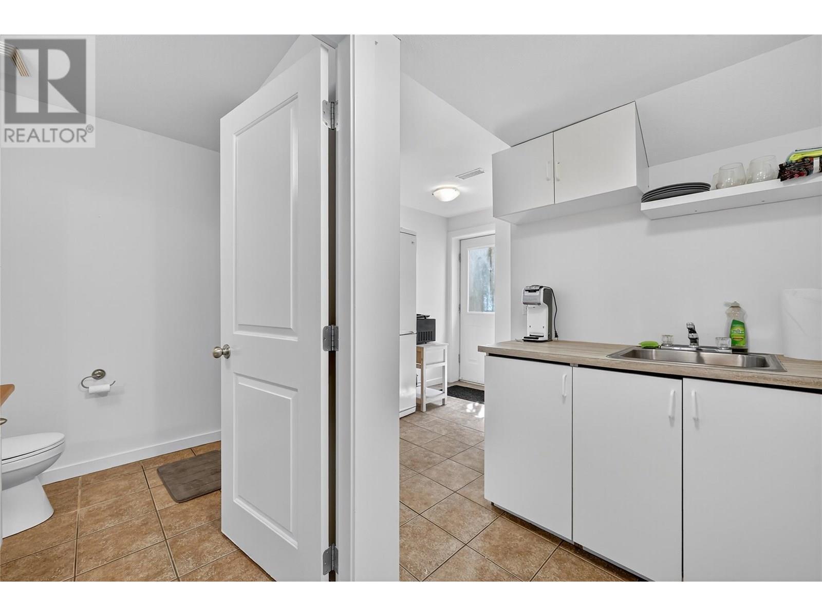 KELOWNA, British Columbia, V1W 4X9, CA, 4 Bedrooms Bedrooms, ,3 BathroomsBathrooms,Residential,For Sale,1898520