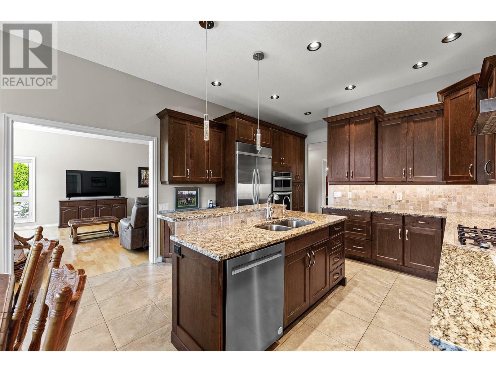KELOWNA, British Columbia, V1V 1W2, CA, 4 Bedrooms Bedrooms, ,3 BathroomsBathrooms,Residential,For Sale,1882323