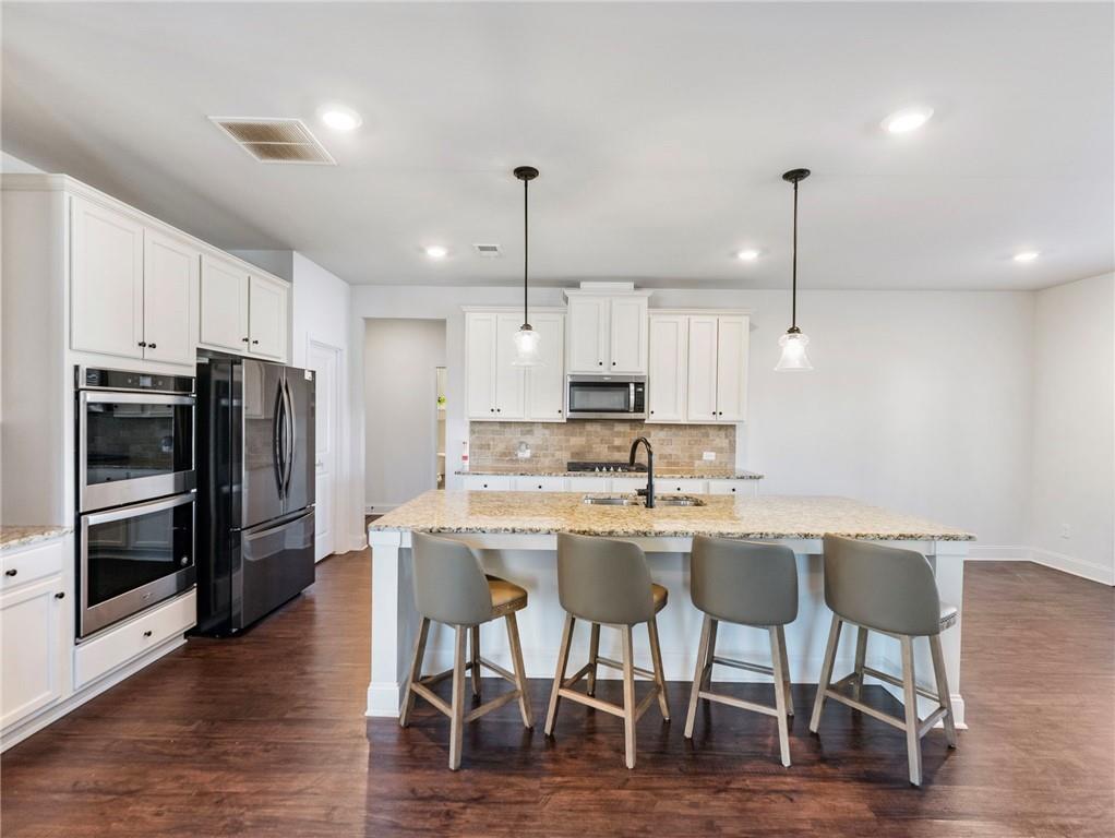 Cumming, Georgia, 30028, United States, 5 Bedrooms Bedrooms, ,4 BathroomsBathrooms,Residential,For Sale,2010449