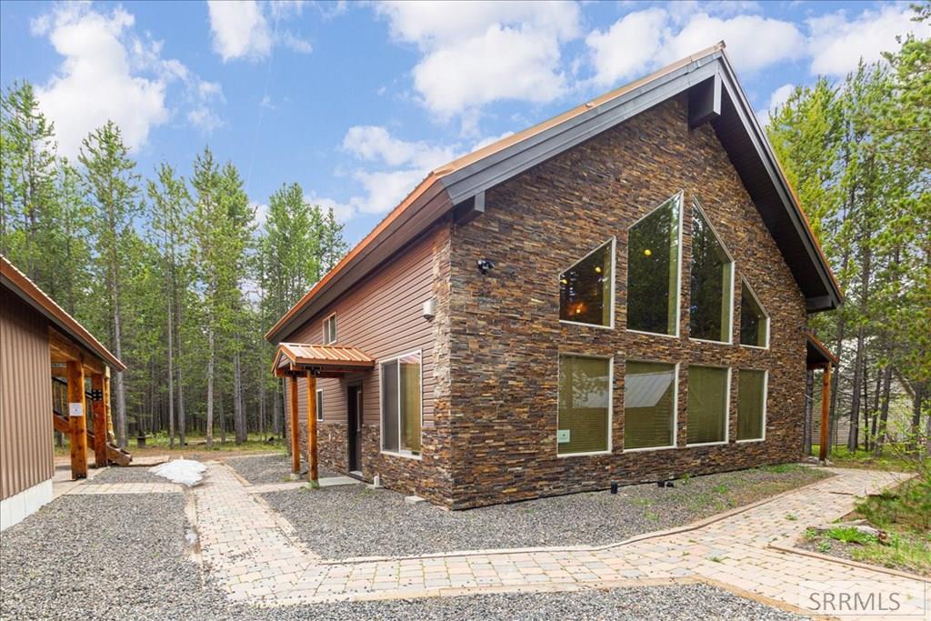 ISLAND PARK, Idaho, 83429, United States, 5 Bedrooms Bedrooms, ,3 BathroomsBathrooms,Residential,For Sale,2005843