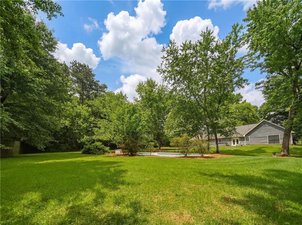 Roswell, Georgia, 30076, United States, 4 Bedrooms Bedrooms, ,3 BathroomsBathrooms,Residential,For Sale,2049337