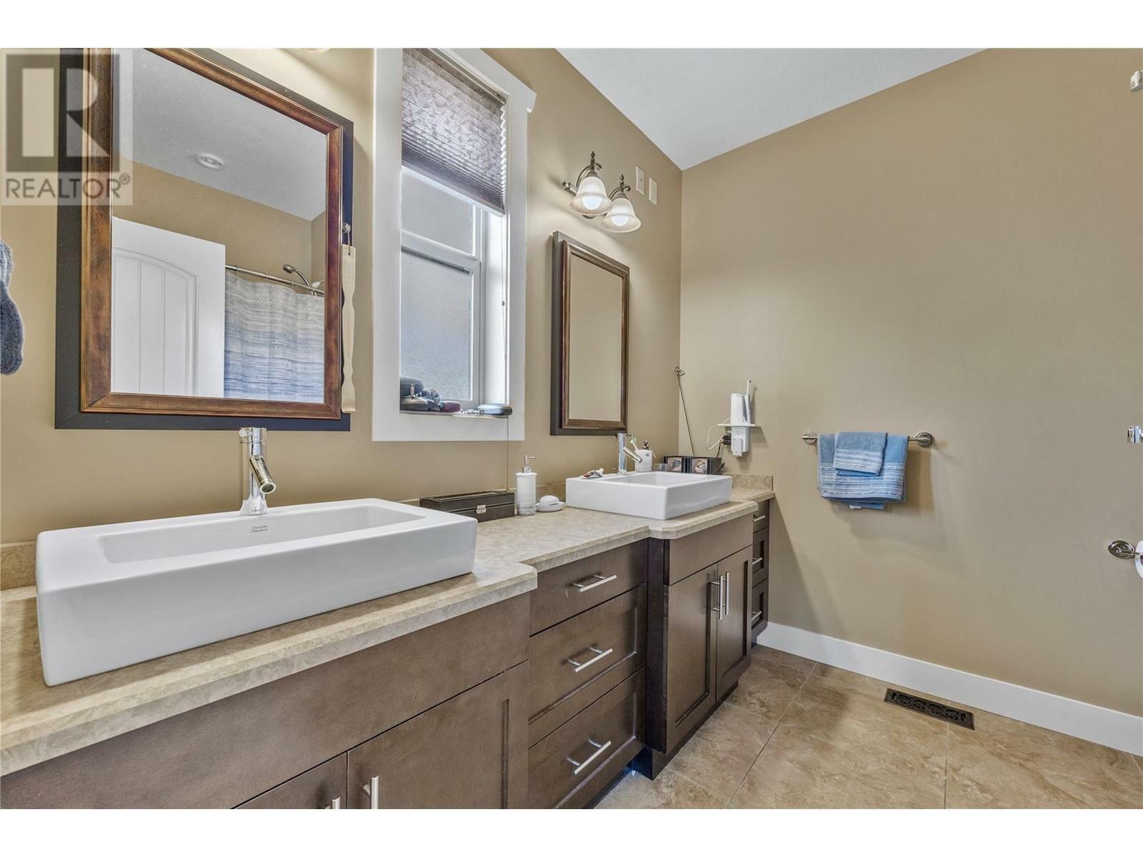 KELOWNA, British Columbia, V1P 1R7, CA, 5 Bedrooms Bedrooms, ,3 BathroomsBathrooms,Residential,For Sale,1837327