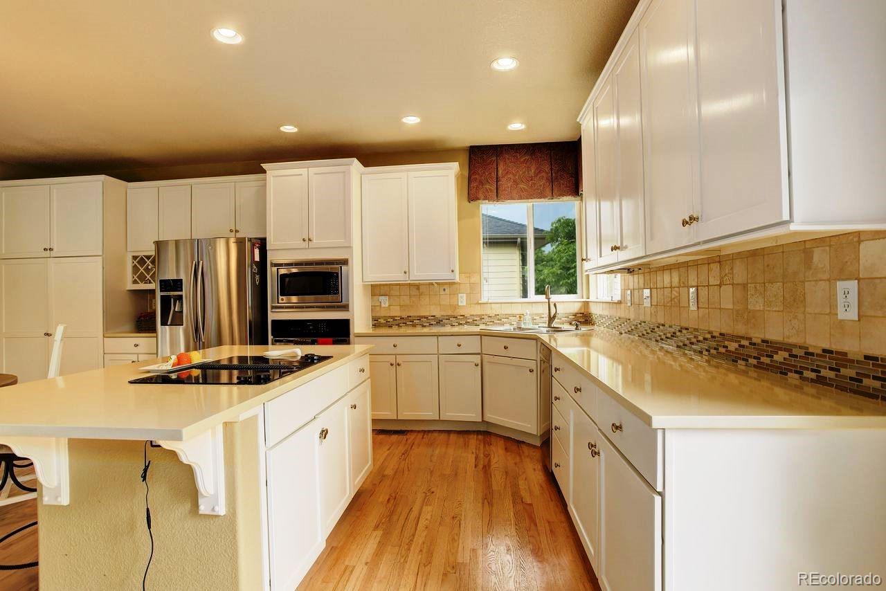 Arvada, Colorado, 80005, United States, 4 Bedrooms Bedrooms, ,2 BathroomsBathrooms,Residential,For Sale,1906341