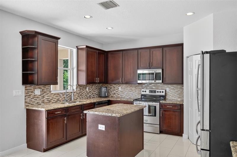 Weston, Florida, 33332, United States, 5 Bedrooms Bedrooms, ,4 BathroomsBathrooms,Residential,For Sale,2003132