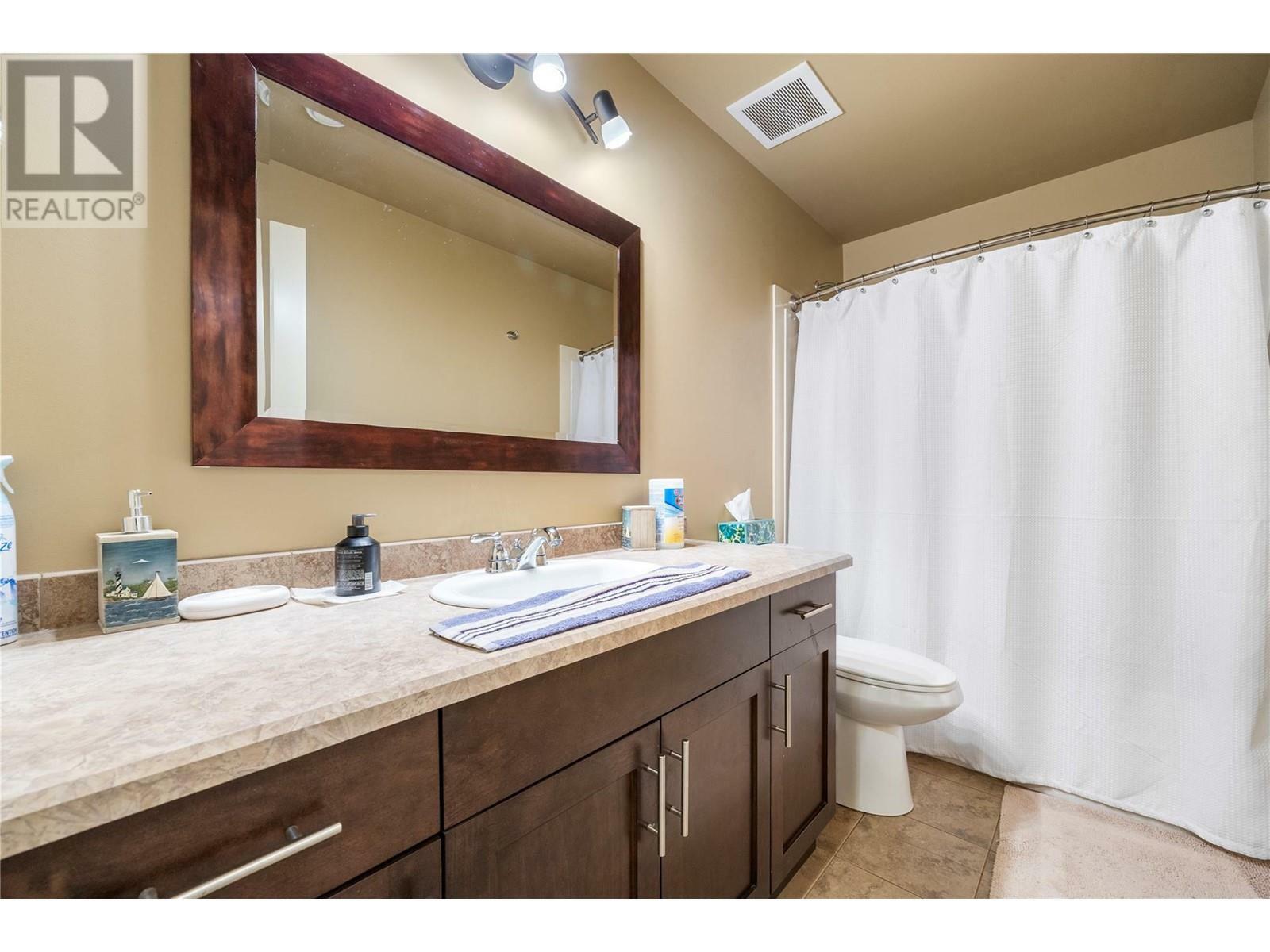 KELOWNA, British Columbia, V1P 1R7, CA, 5 Bedrooms Bedrooms, ,3 BathroomsBathrooms,Residential,For Sale,1837327