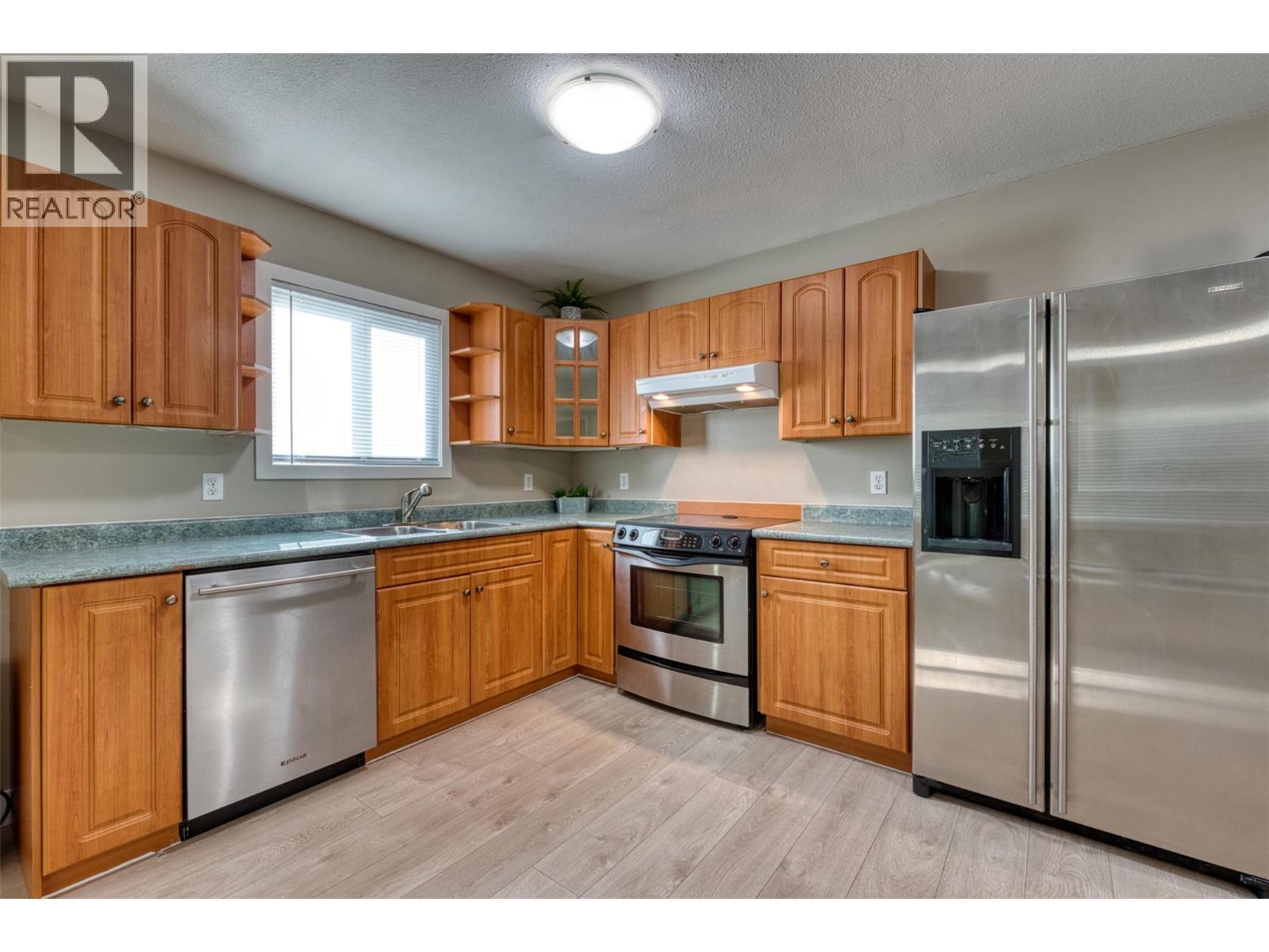 KELOWNA, British Columbia, V1Y 6S9, CA, 5 Bedrooms Bedrooms, ,3 BathroomsBathrooms,Residential,For Sale,1876948