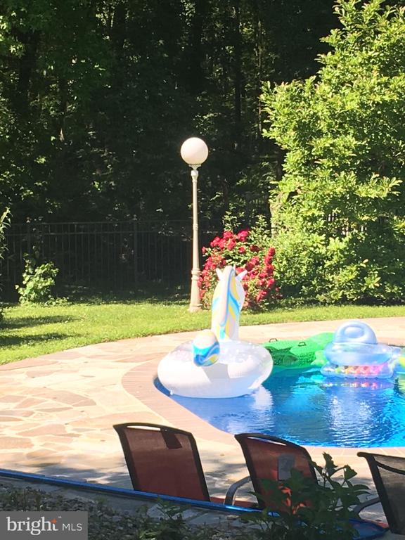 Manalapan, New Jersey, 07726, United States, 4 Bedrooms Bedrooms, ,3 BathroomsBathrooms,Residential,For Sale,1977745