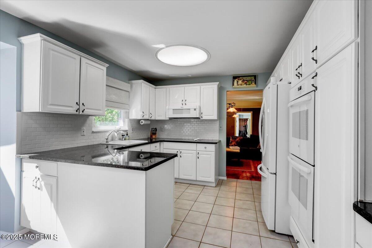 Morganville, New Jersey, 07751, United States, 4 Bedrooms Bedrooms, ,3 BathroomsBathrooms,Residential,For Sale,1914665