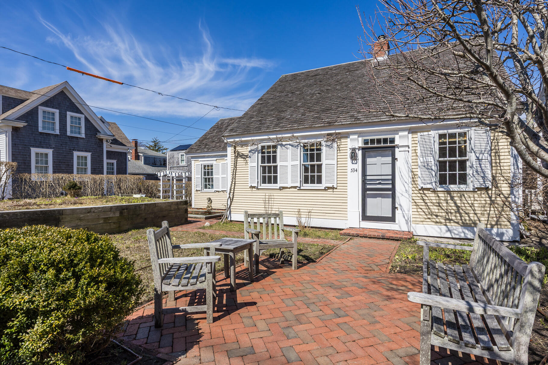 Historic East End Gem with Guest Apartment, Garden Oasis & Beach Proximity