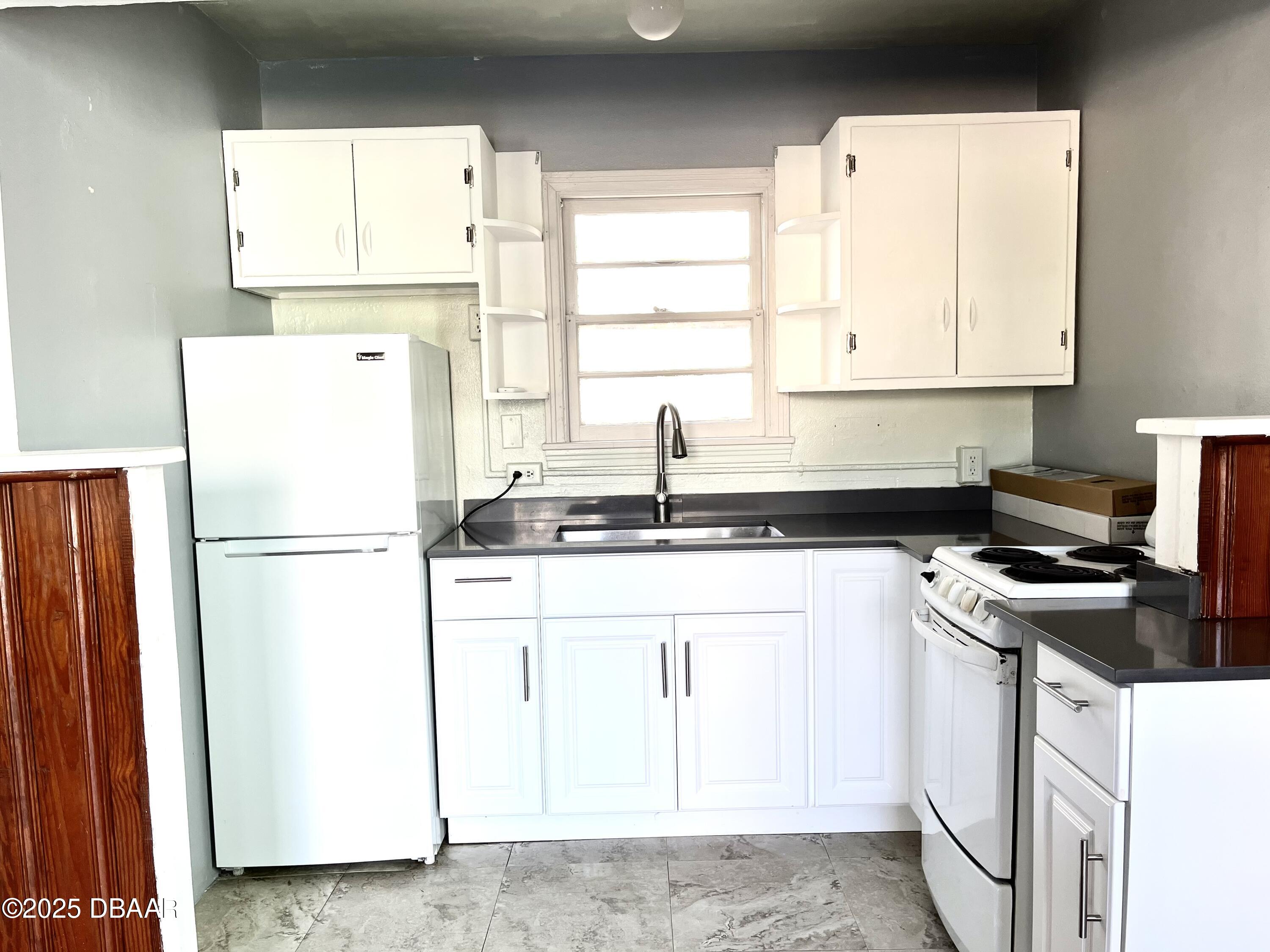 311-313 N Oleander Avenue, Daytona Beach, Florida, 32118, United States, 3 Bedrooms Bedrooms, ,3 BathroomsBathrooms,Residential,For Sale,311-313 N Oleander Avenue,1613625
