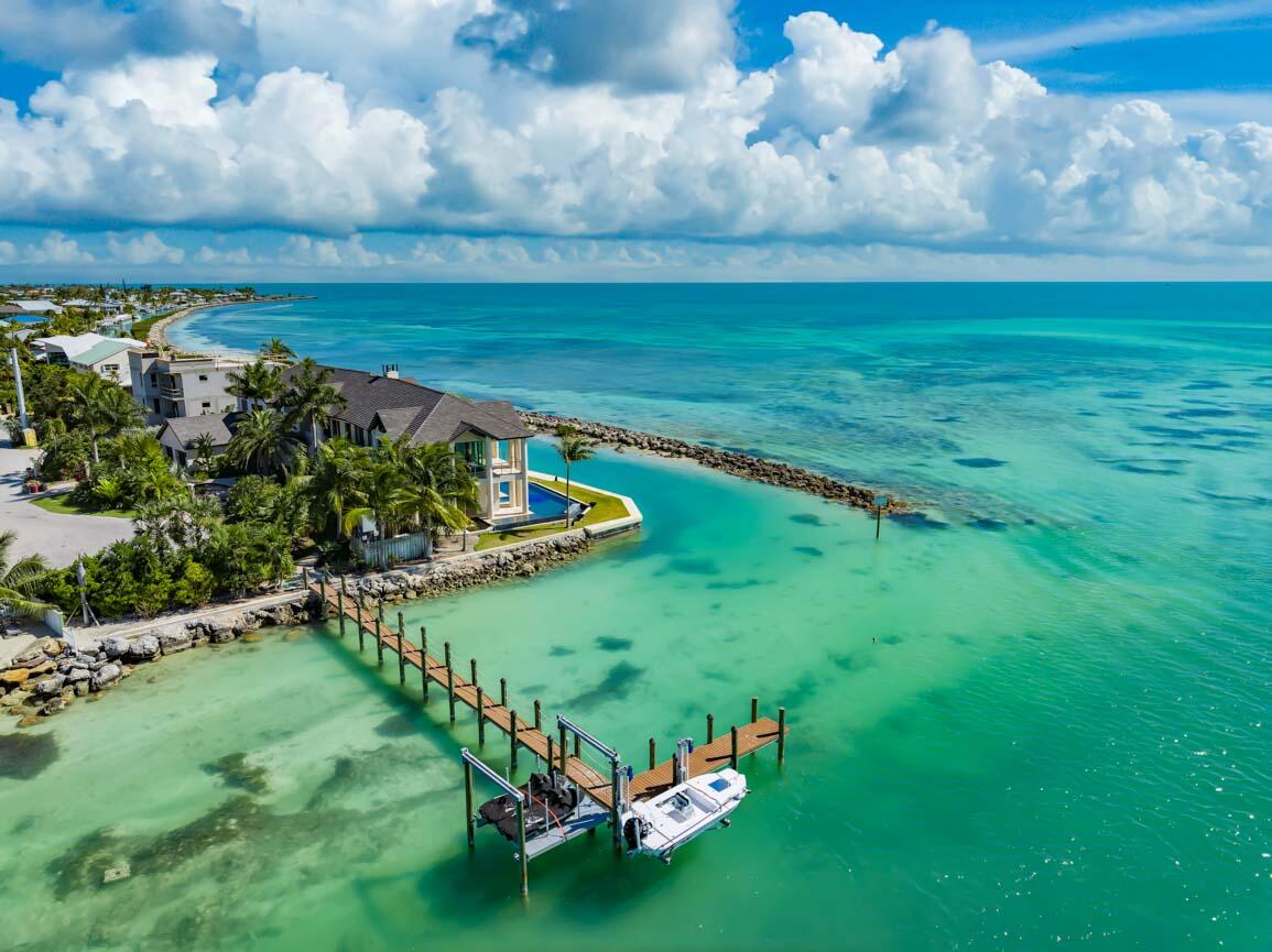 Duck, Florida, 33050, United States, 3 Bedrooms Bedrooms, ,4 BathroomsBathrooms,Residential,For Sale,1970637