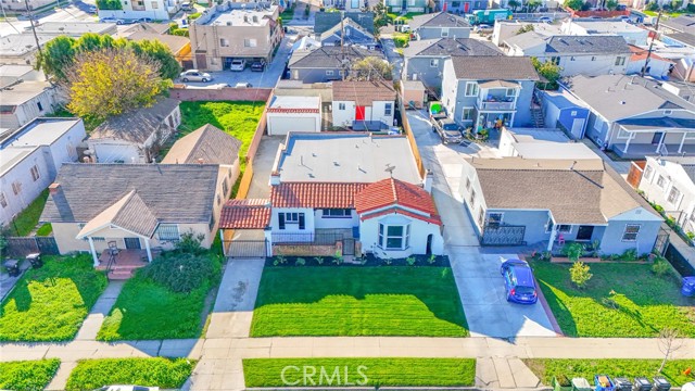 Los Angeles, California, 90047, United States, 5 Bedrooms Bedrooms, ,Residential,For Sale,2009243