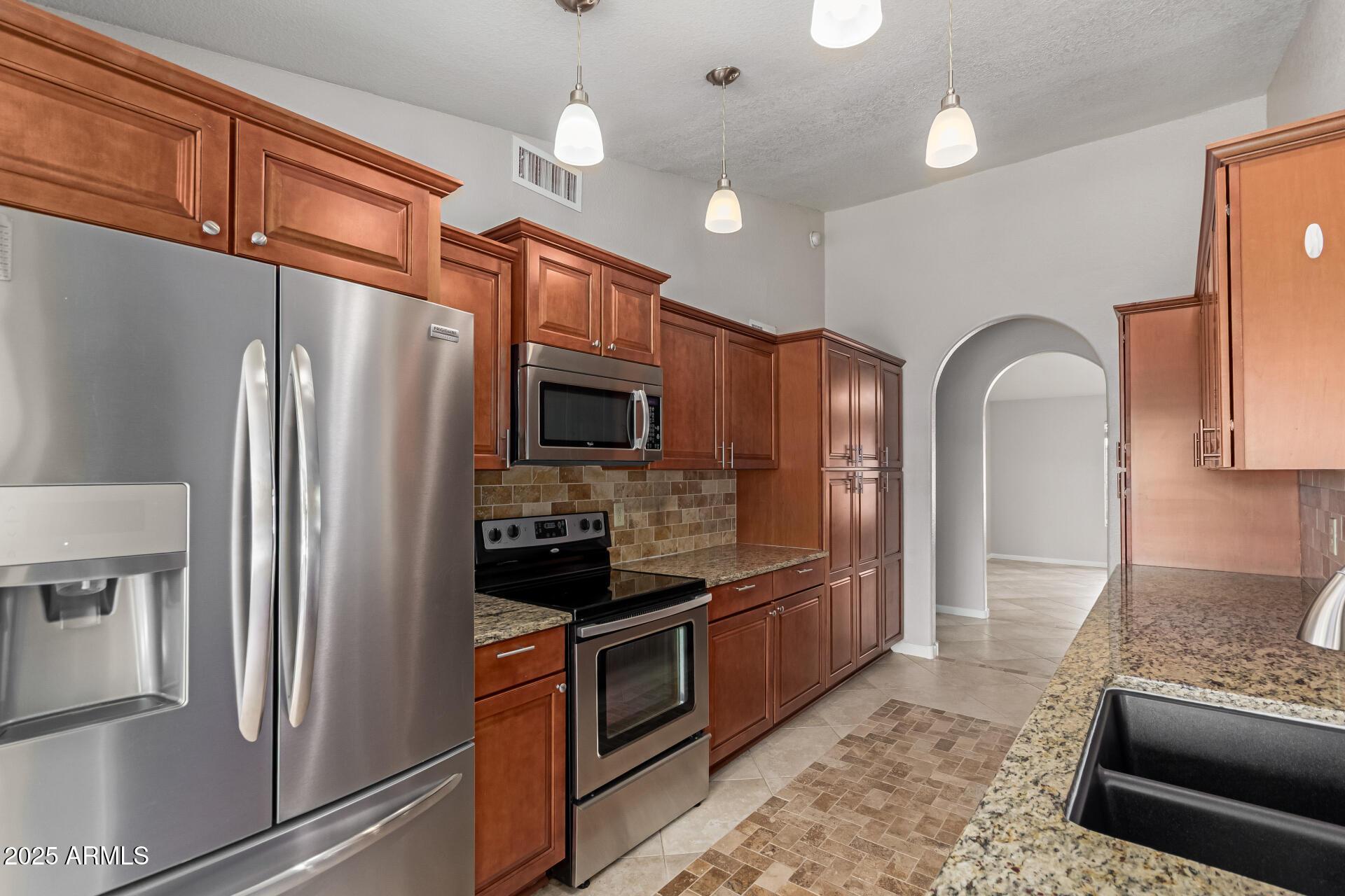 Peoria, Arizona, 85381, United States, 4 Bedrooms Bedrooms, ,3 BathroomsBathrooms,Residential,For Sale,1927845