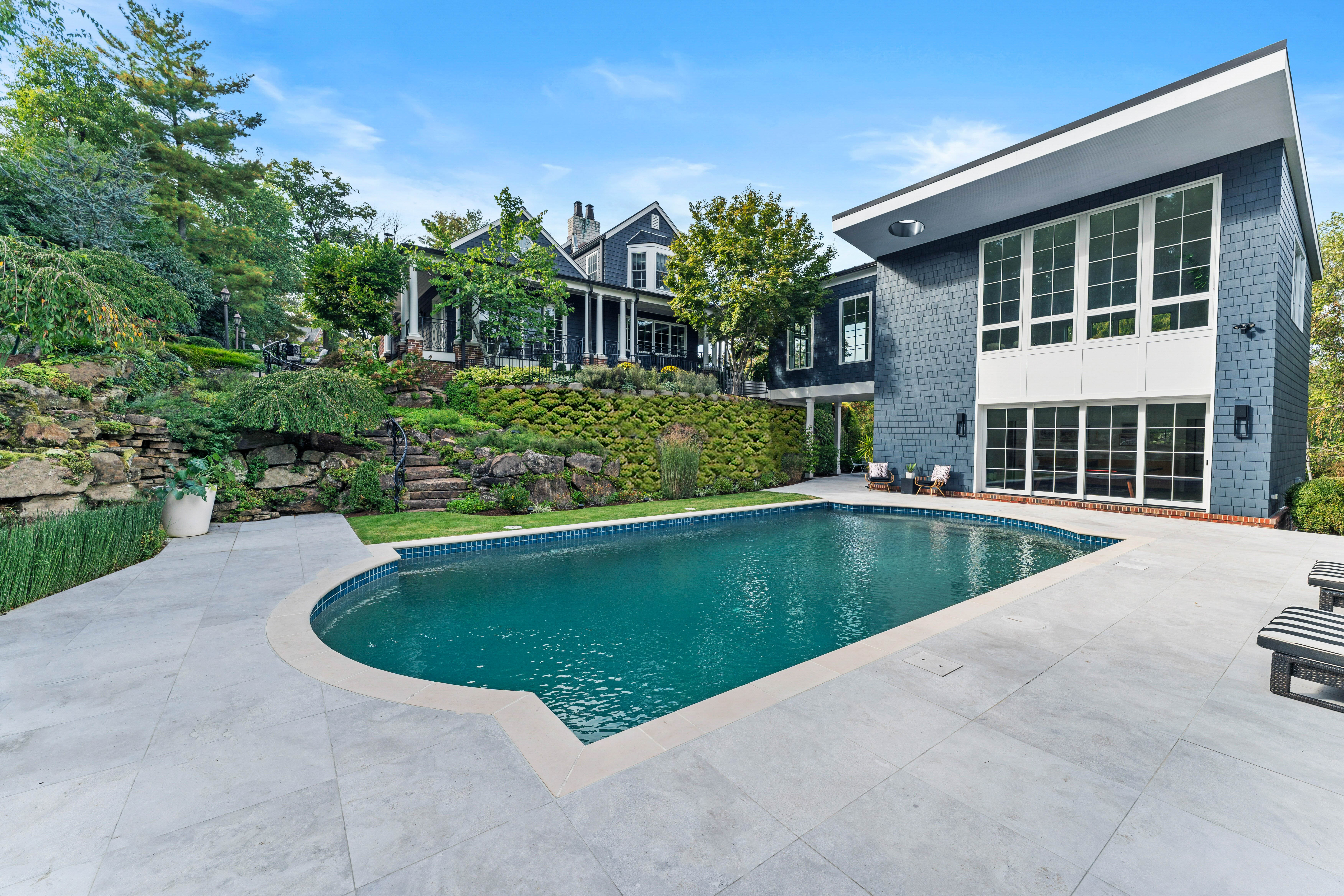  Stunning Private Estate Tucked Away on one of Ladue