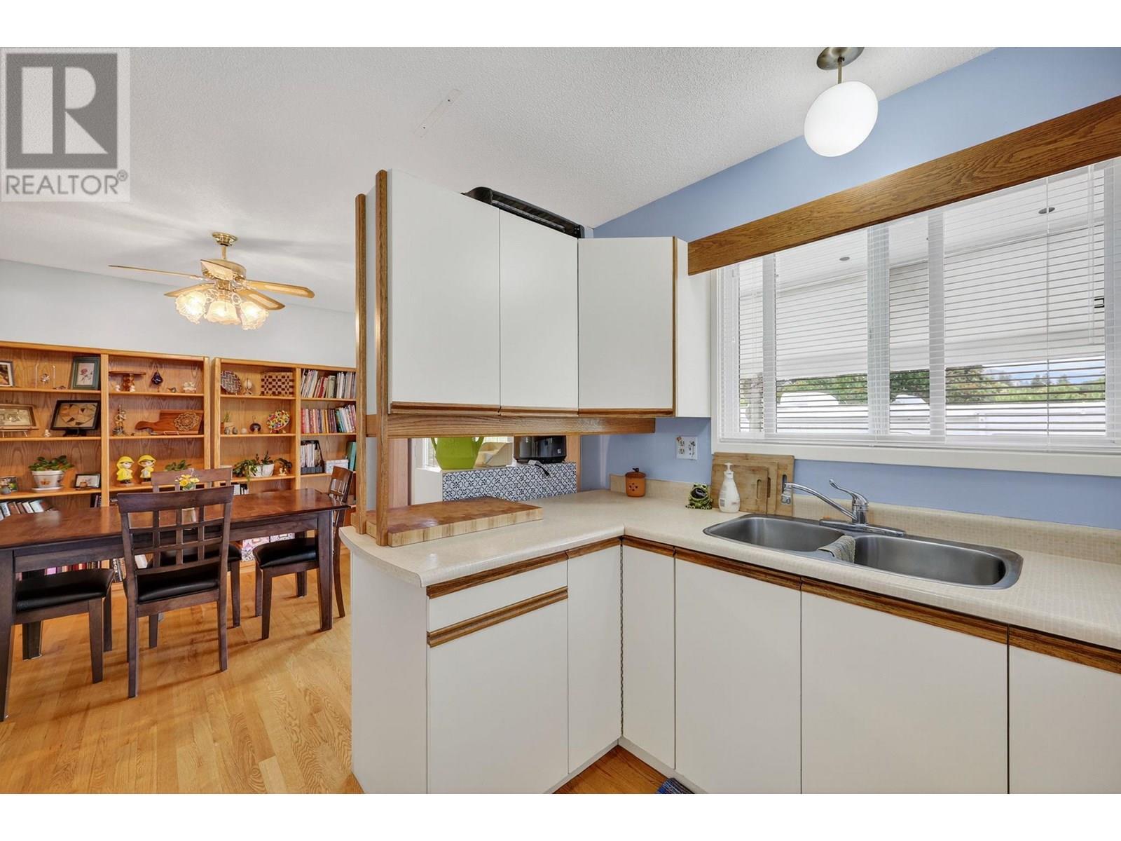 KELOWNA, British Columbia, V1Y 3S7, CA, 5 Bedrooms Bedrooms, ,2 BathroomsBathrooms,Residential,For Sale,1902795