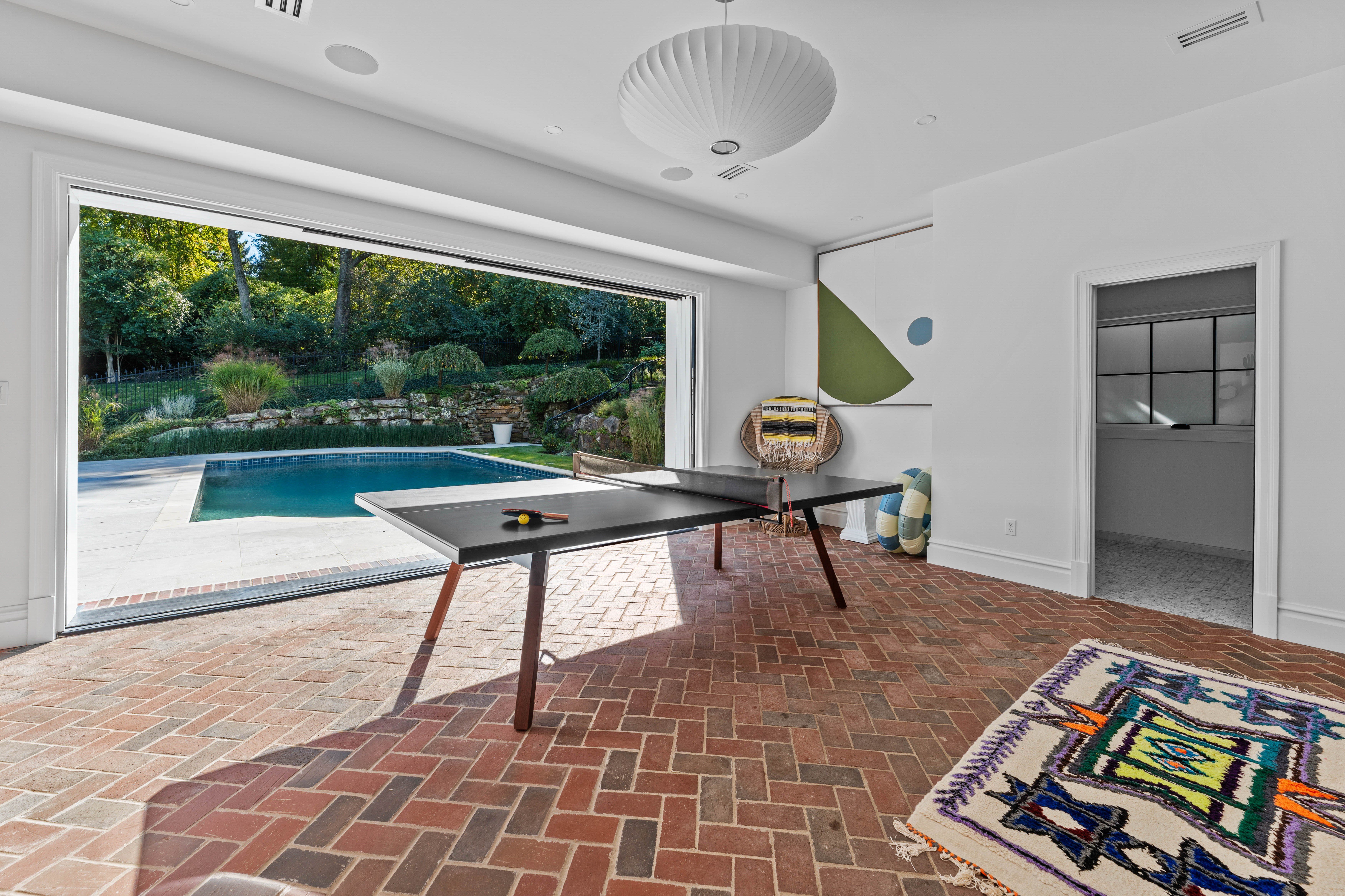  Stunning Private Estate Tucked Away on one of Ladue