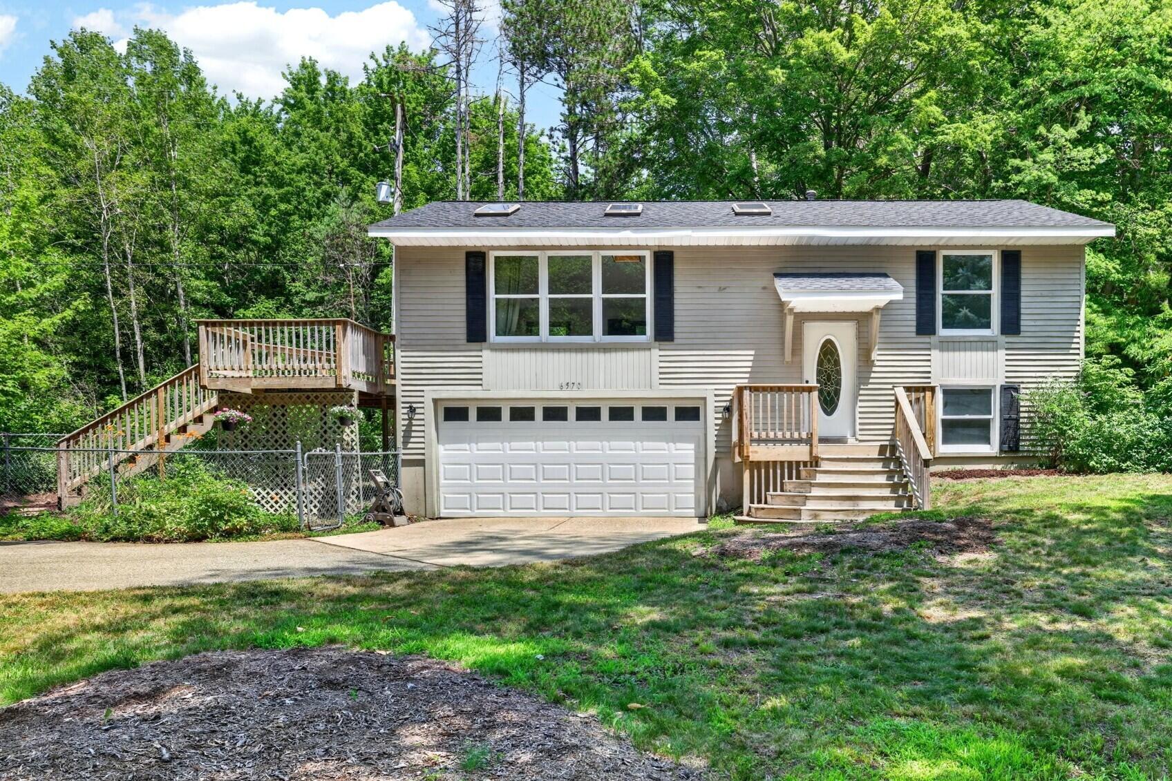 Holly Dr, West Olive, MI 49460