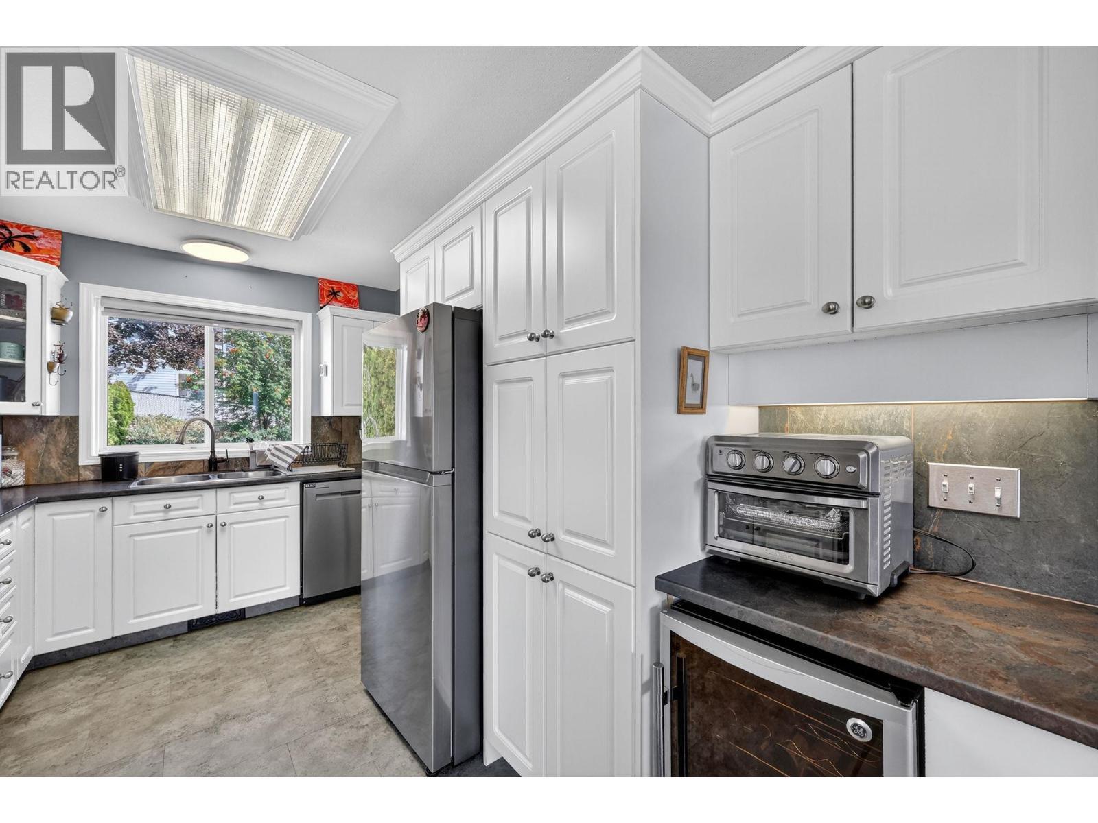 KELOWNA, British Columbia, V1X 7T6, CA, 4 Bedrooms Bedrooms, ,2 BathroomsBathrooms,Residential,For Sale,1918347