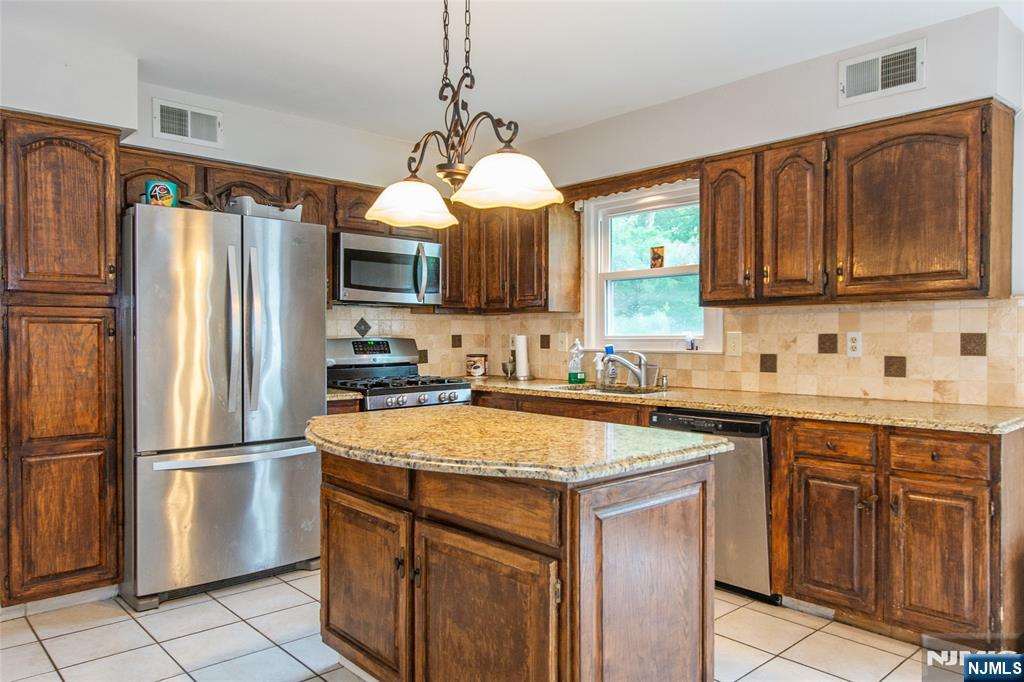 Wayne, New Jersey, 07470, United States, 4 Bedrooms Bedrooms, ,3 BathroomsBathrooms,Residential,For Sale,1857394