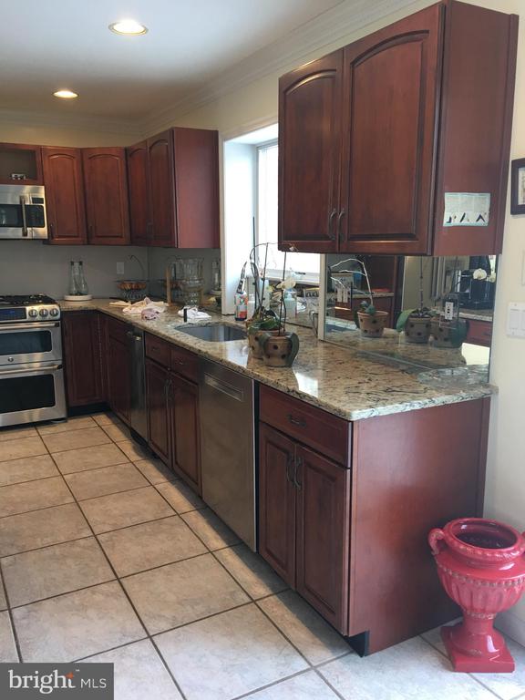 Manalapan, New Jersey, 07726, United States, 4 Bedrooms Bedrooms, ,3 BathroomsBathrooms,Residential,For Sale,1977745