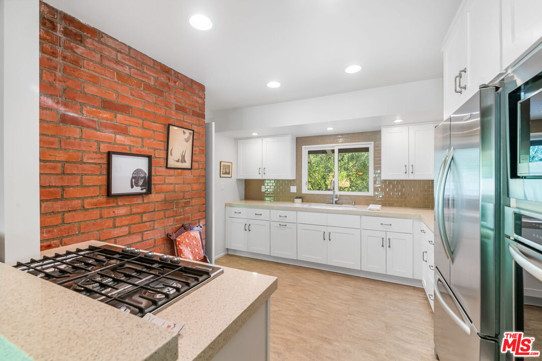 Los Angeles, California, 90049, United States, 4 Bedrooms Bedrooms, ,3 BathroomsBathrooms,Residential,For Sale,1805852