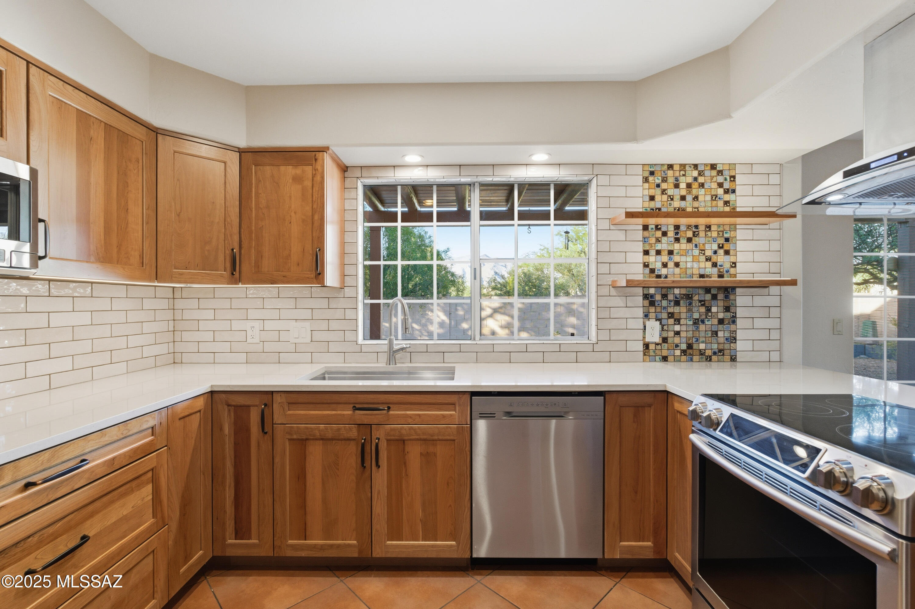 Tucson, Arizona, 85712, United States, 4 Bedrooms Bedrooms, ,3 BathroomsBathrooms,Residential,For Sale,1989179