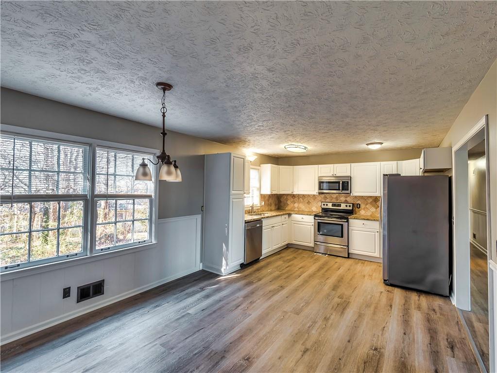 Woodstock, Georgia, 30188, United States, 4 Bedrooms Bedrooms, ,3 BathroomsBathrooms,Residential,For Sale,1974094