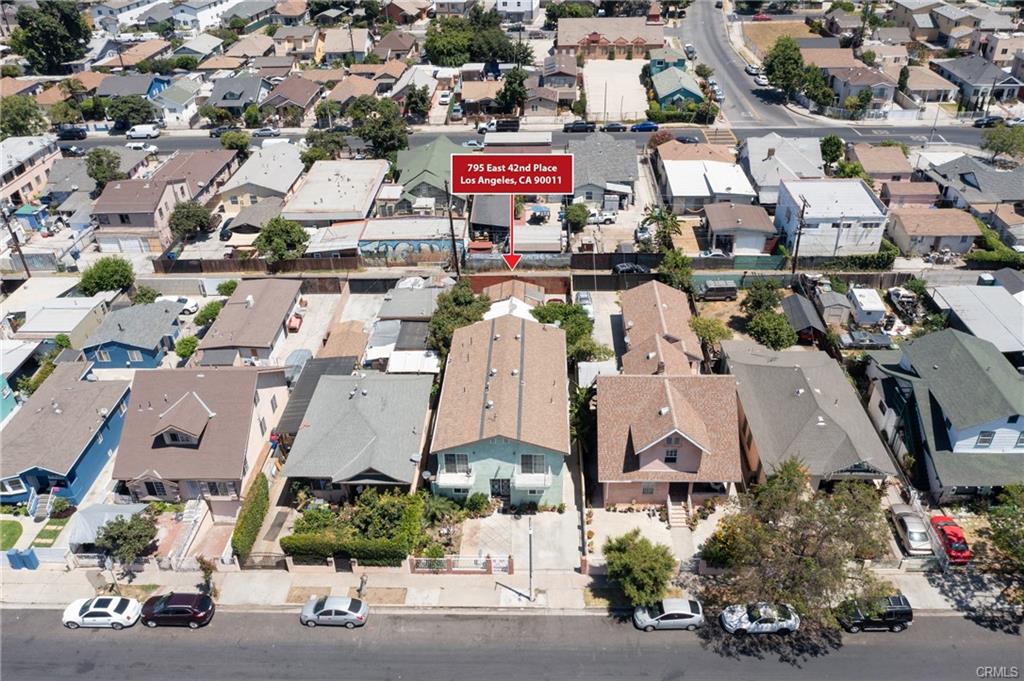 Los Angeles, California, 90011, United States, 6 Bedrooms Bedrooms, ,5 BathroomsBathrooms,Residential,For Sale,1974458